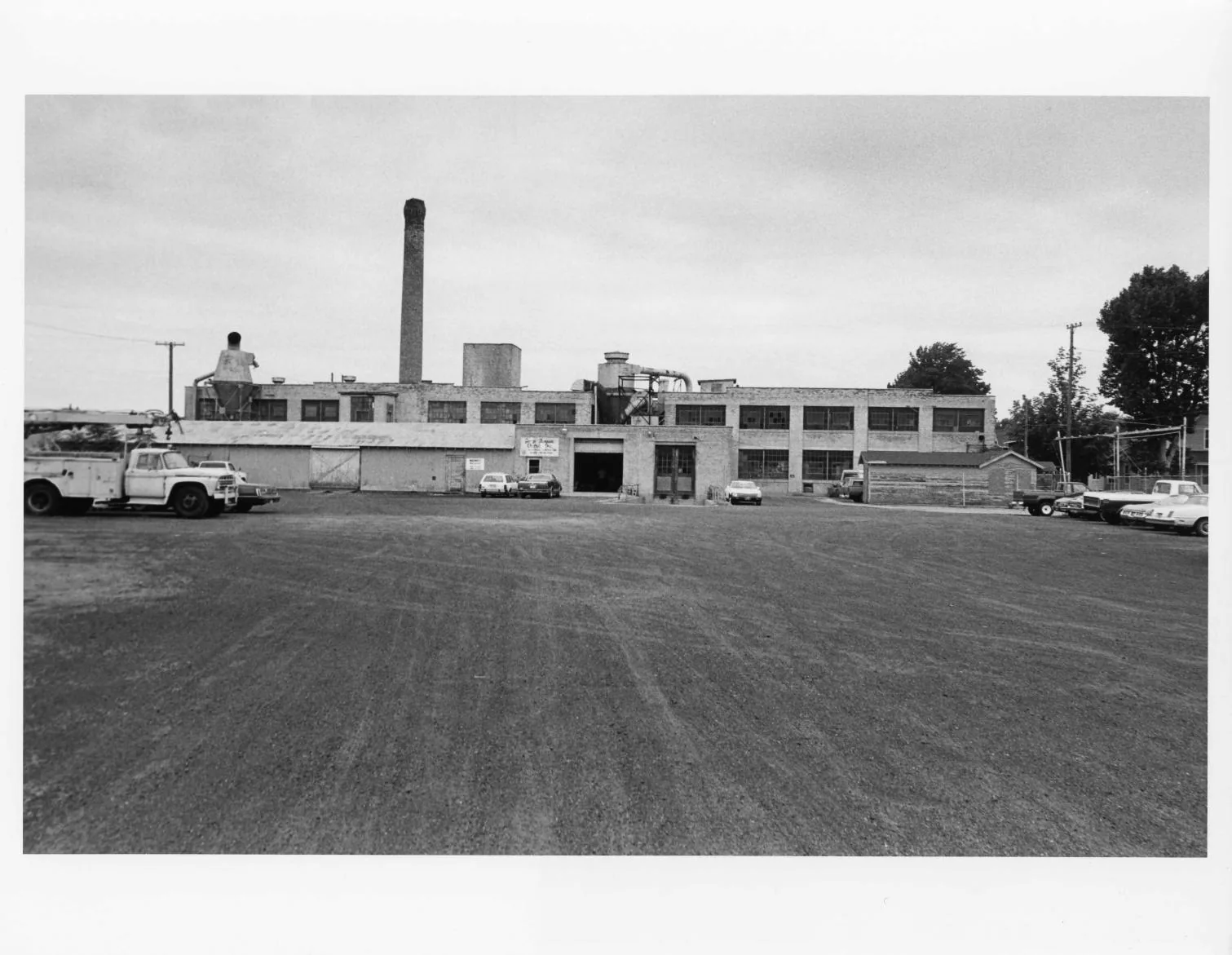 Black-and-white photographs of the Buescher Band Instrument Company Building, 1986: Rear Elevation (1986)